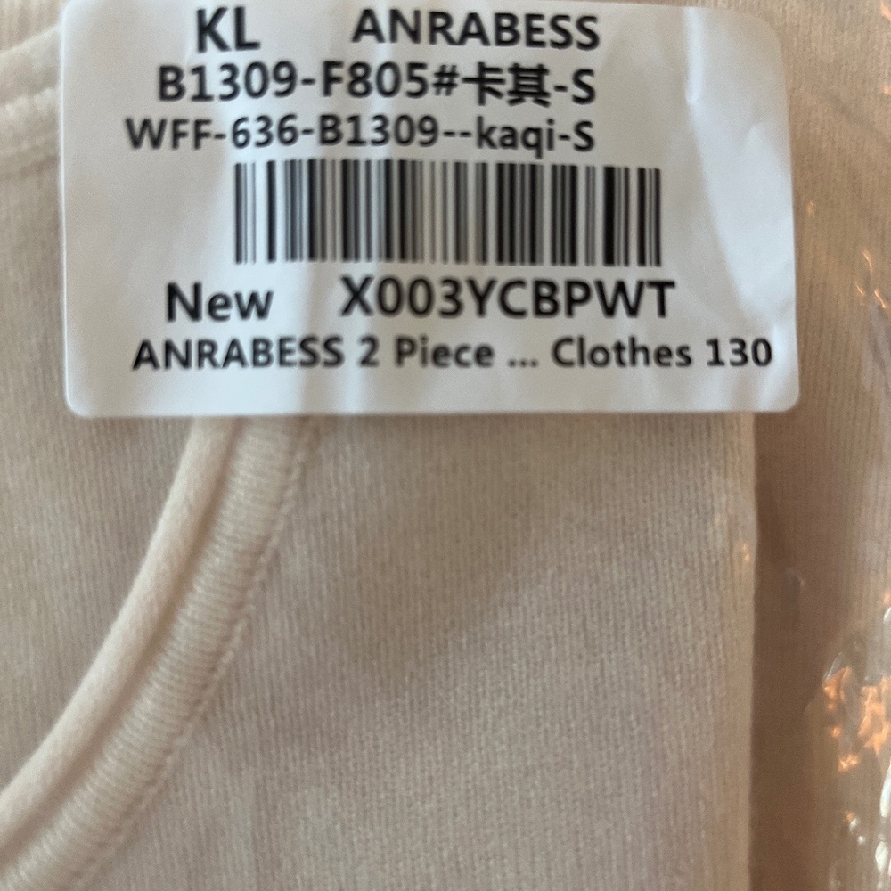 Two Piece Women’s Sleeveless Top and Knit Pants